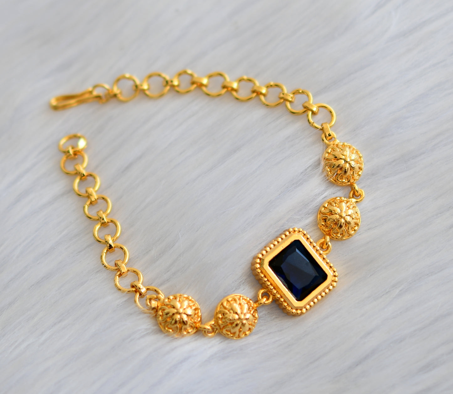 Gold tone blue block stone bracelet dj-40504