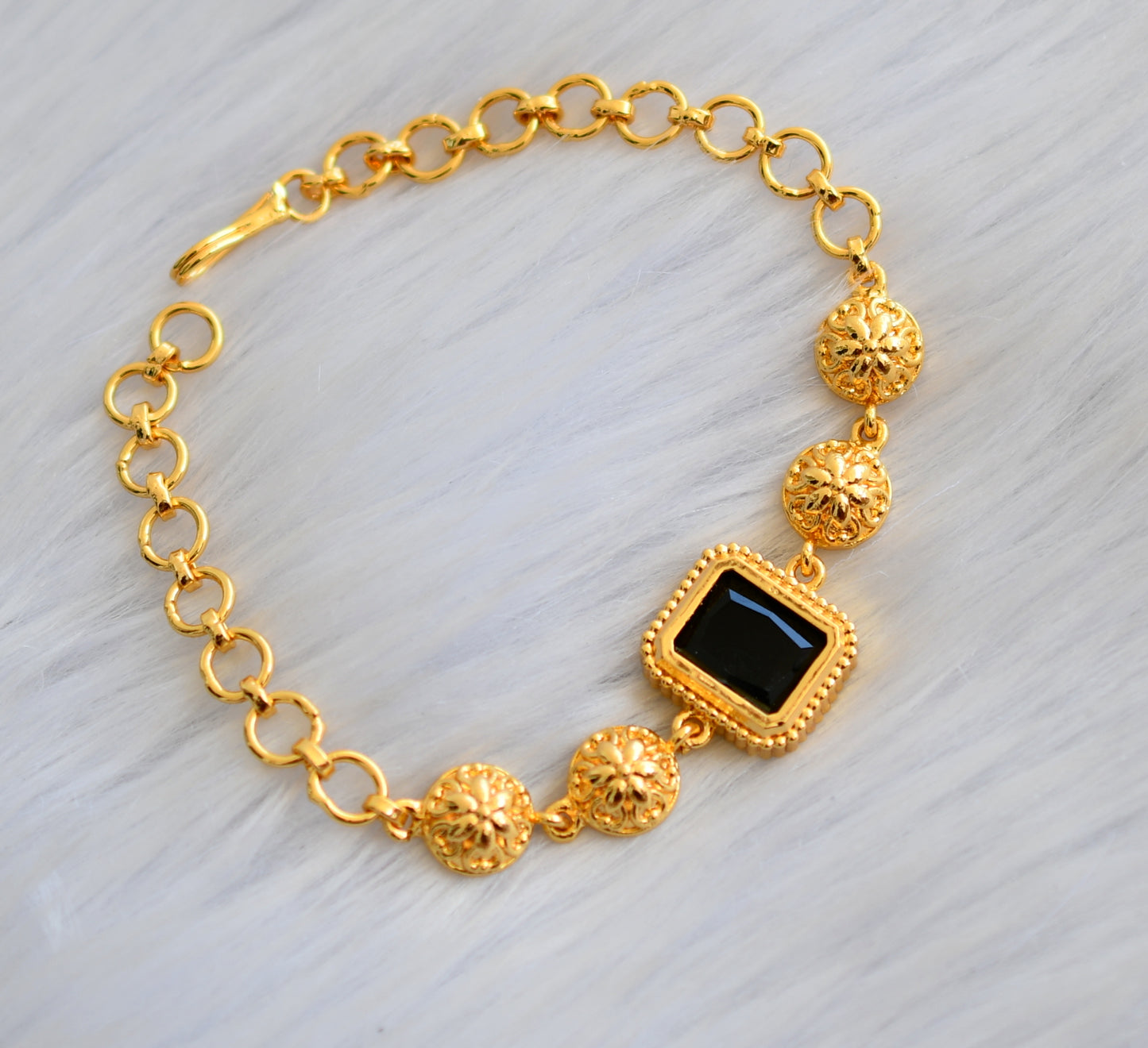 Gold tone black block stone bracelet dj-40505