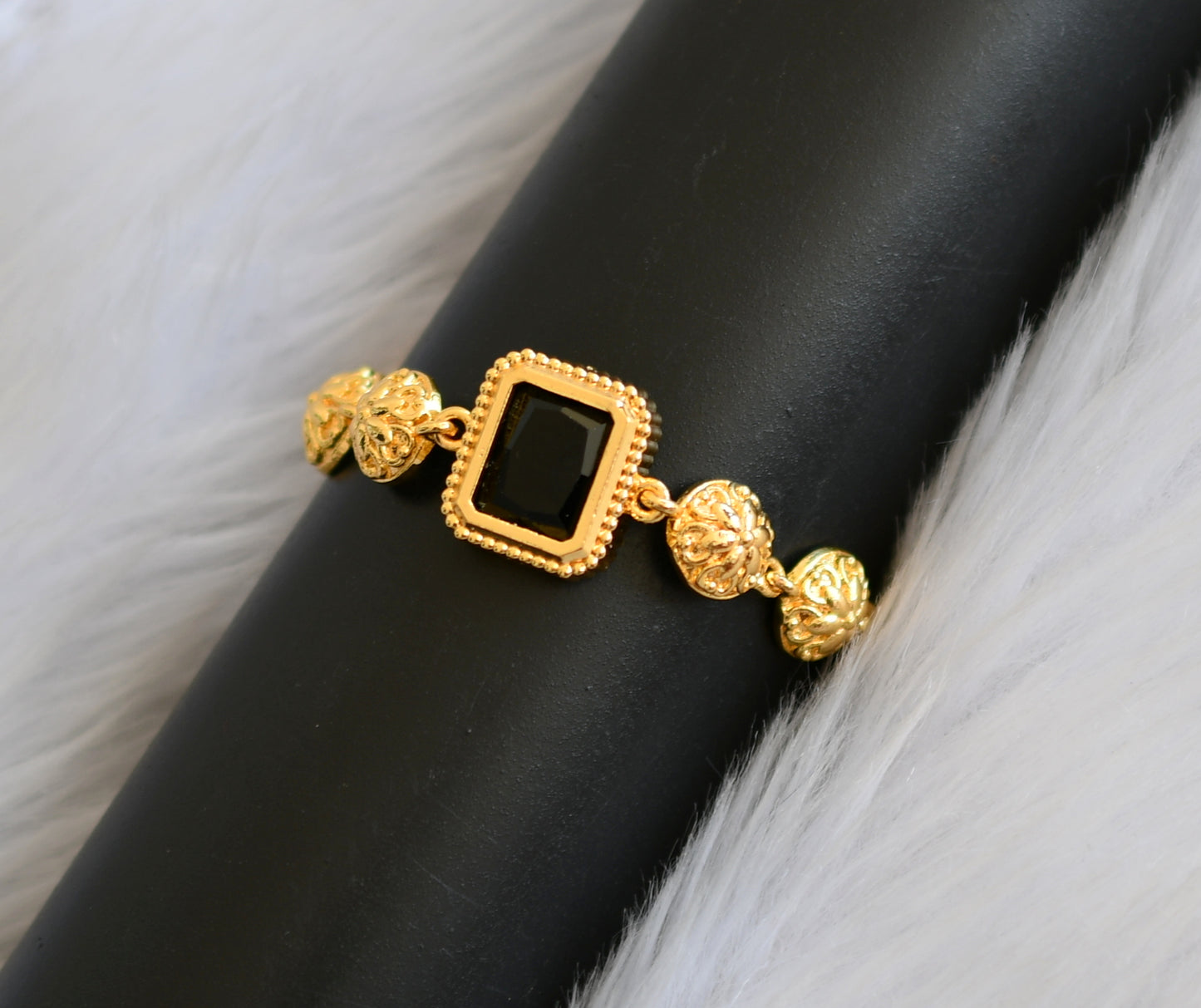 Gold tone black block stone bracelet dj-40505