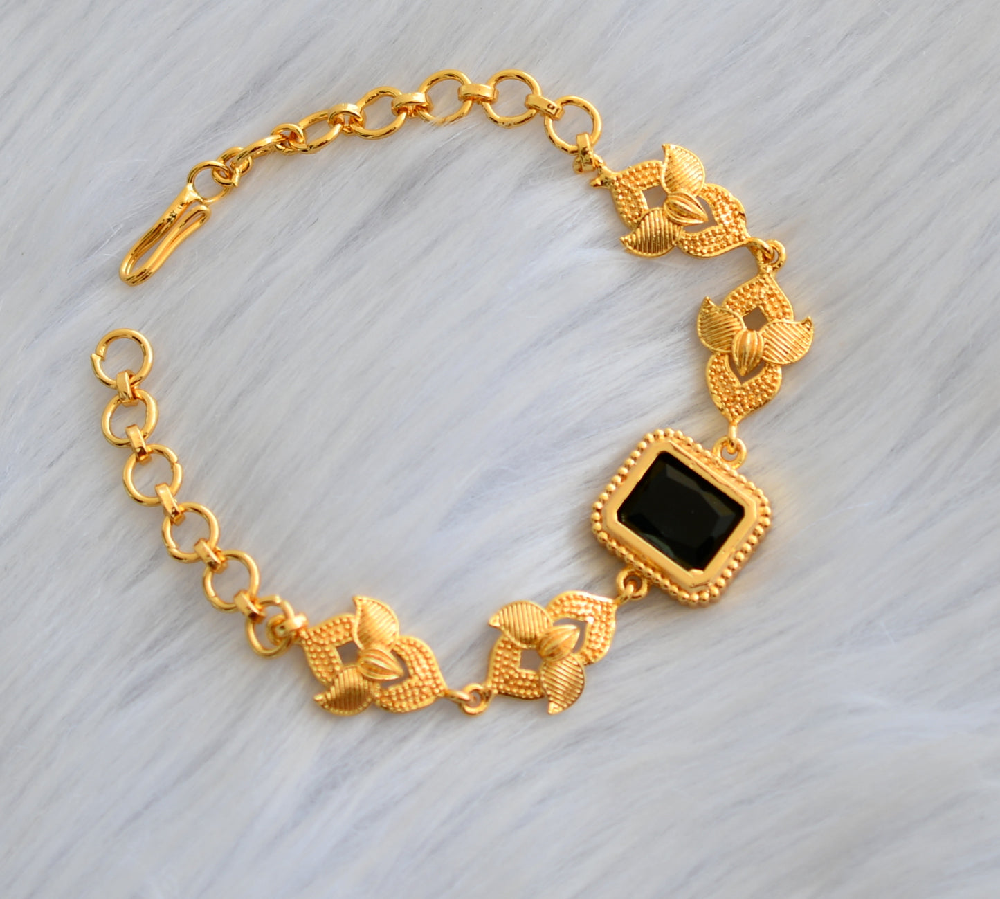 Gold tone black block stone bracelet dj-40510
