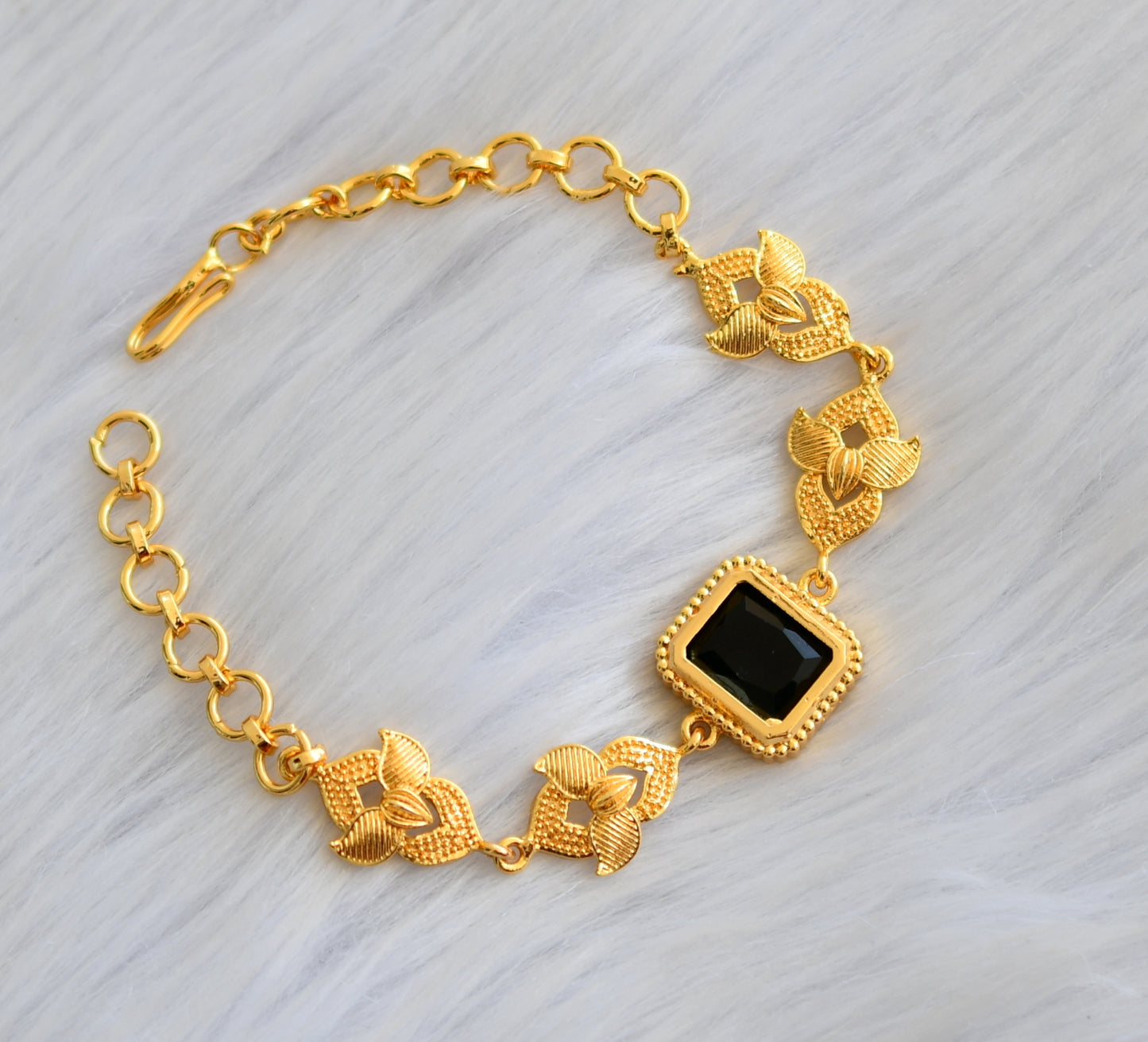 Gold tone black block stone bracelet dj-40510