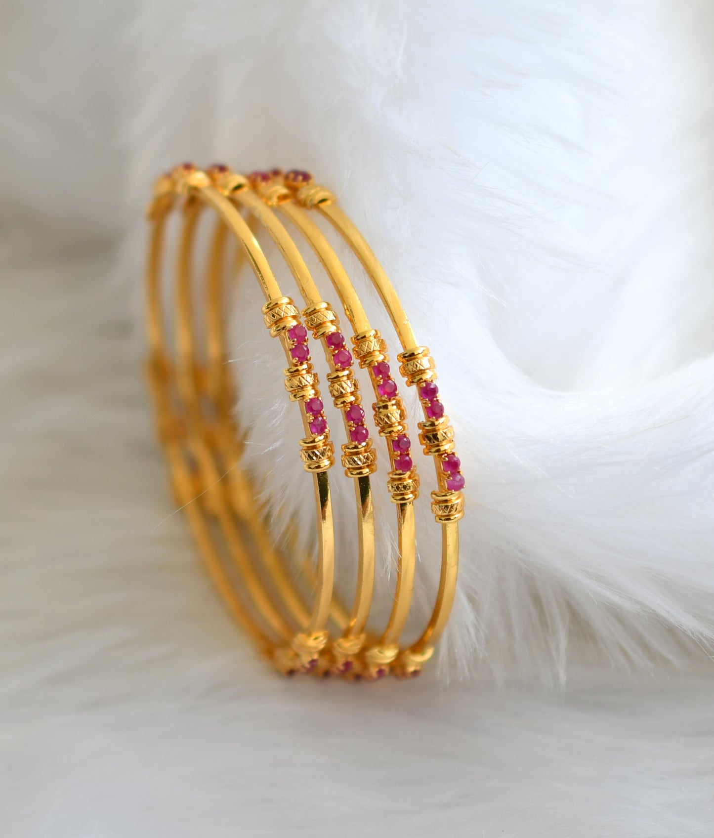 Gold tone ruby set of 4 bangles (2.4) dj-39066