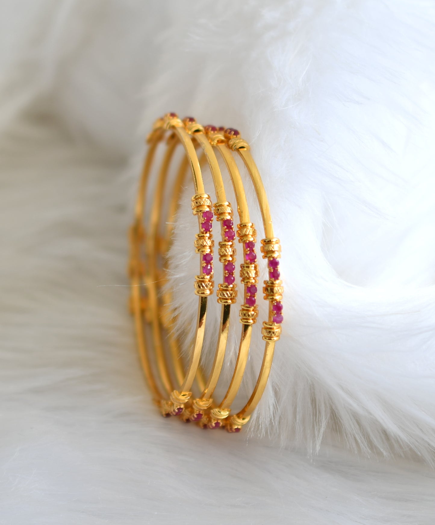 Gold tone ruby set of 4 bangles (2.4) dj-39066
