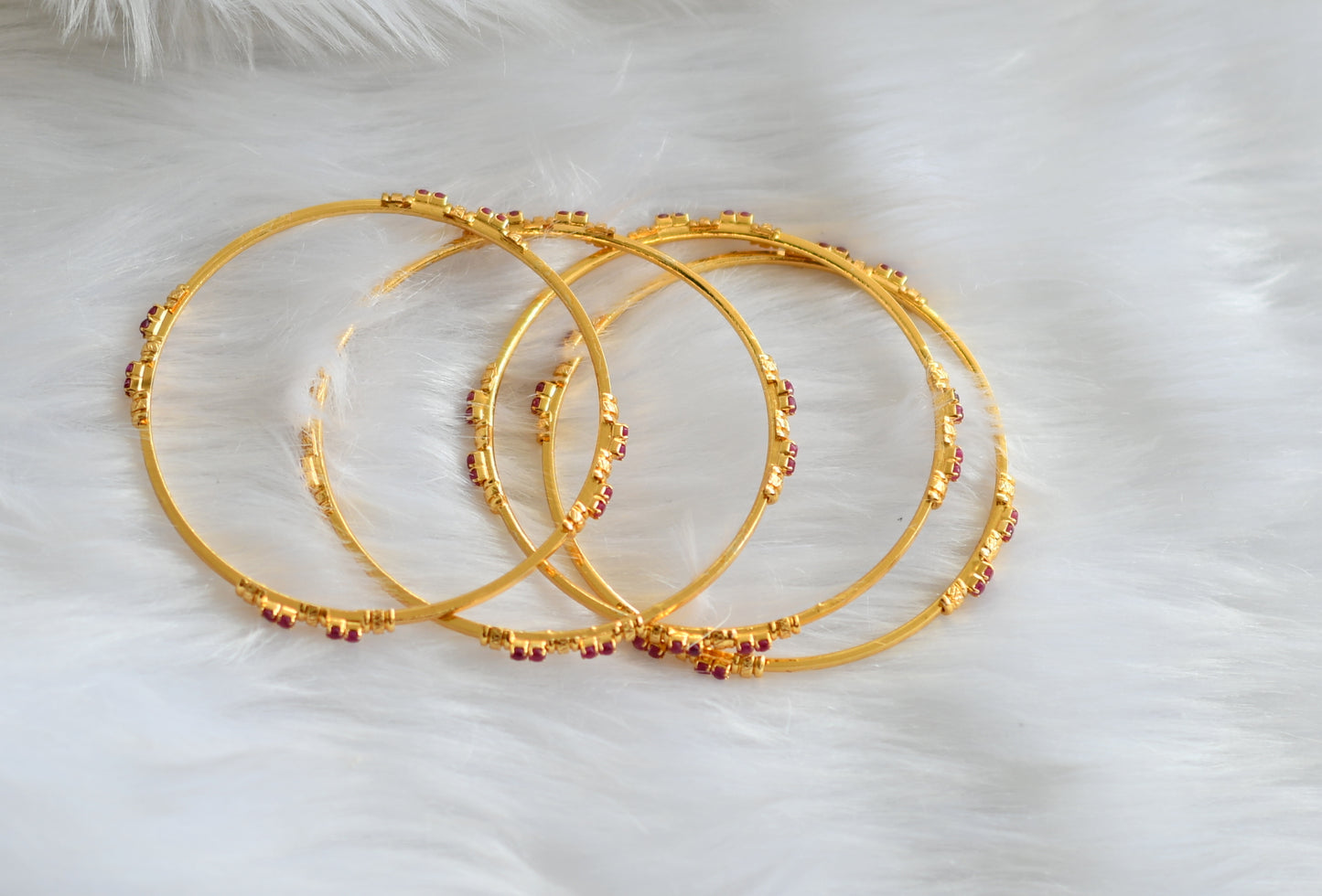 Gold tone ruby set of 4 bangles (2.4) dj-39066