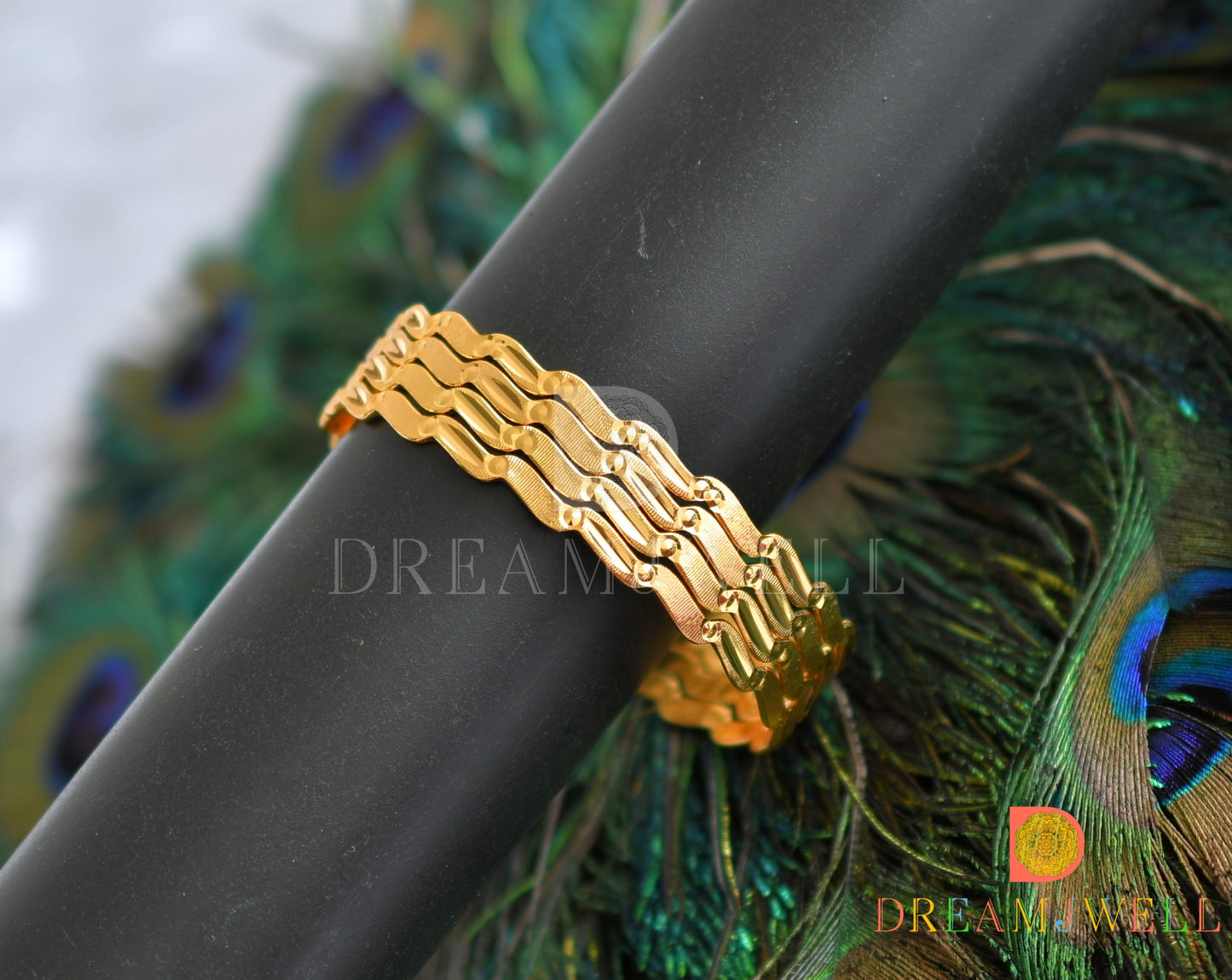 Gold tone set of 4 Bangles (2.8) dj-38238