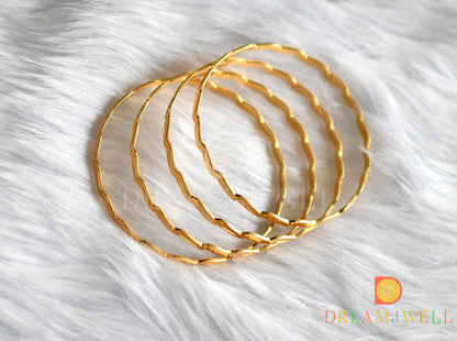 Gold tone set of 4 Bangles (2.8) dj-38238