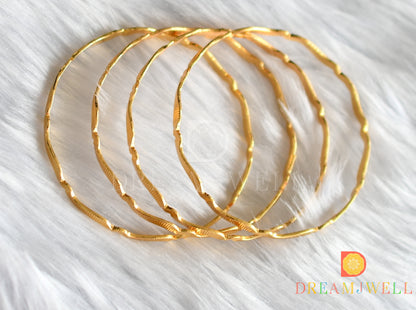 Gold tone set of 4 Bangles (2.4) dj-38239