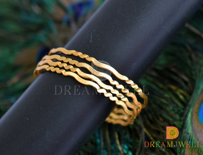 Gold tone set of 4 Bangles (2.4) dj-38251