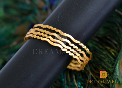 Gold tone set of 4 Bangles (2.4) dj-38251