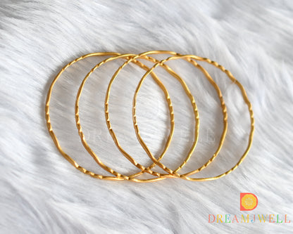 Gold tone set of 4 Bangles (2.4) dj-38251