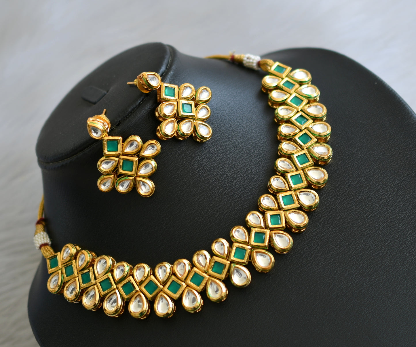 Gold tone green-white kundan jadau necklace set dj-40637