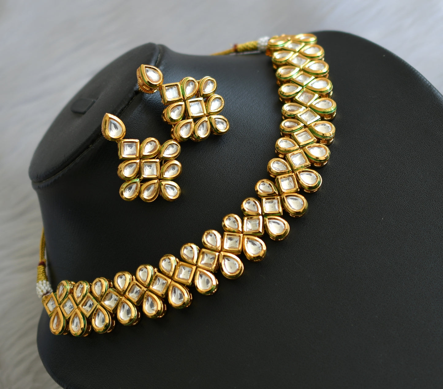 Gold tone white kundan necklace set dj-40639