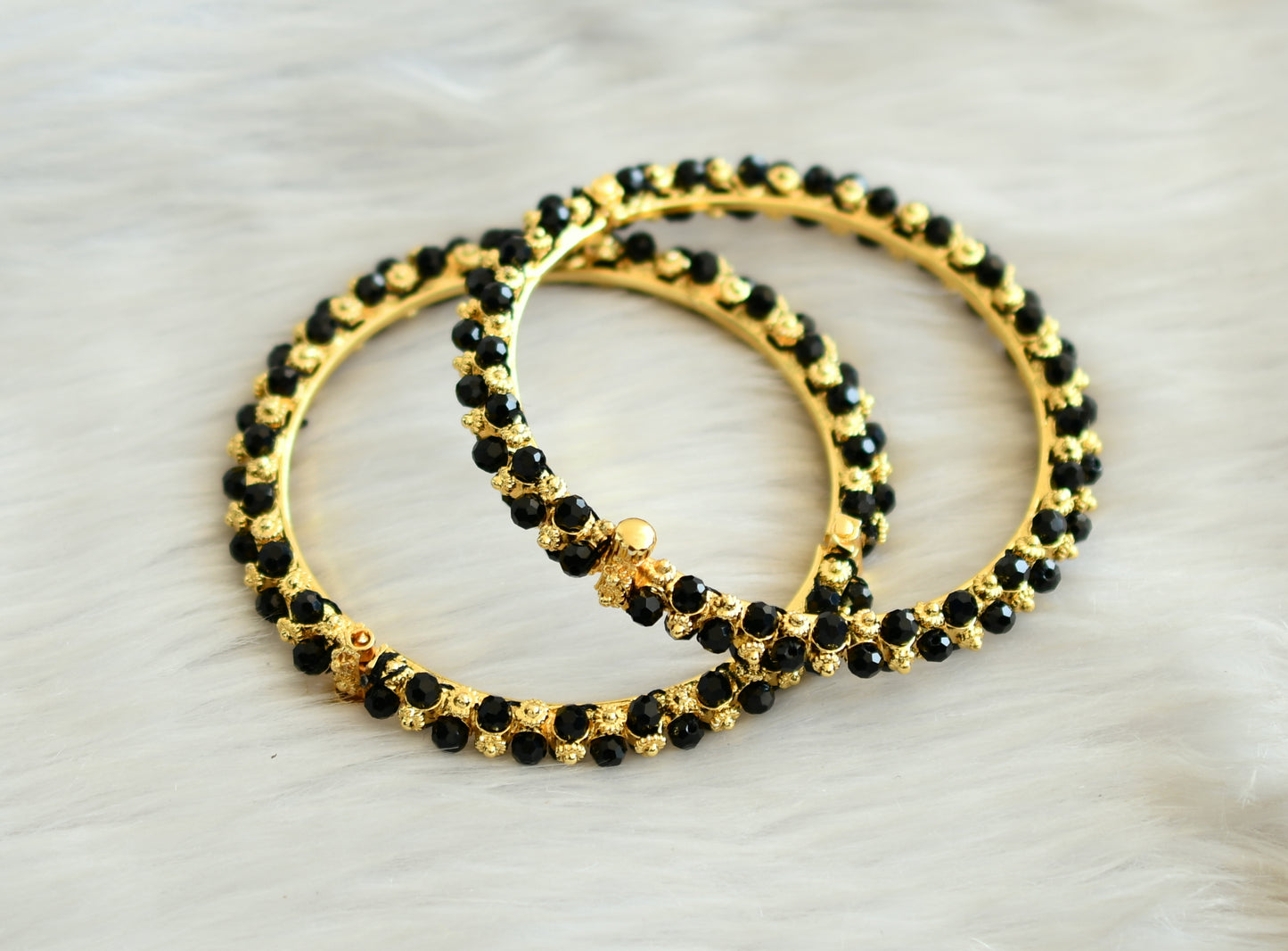 Gold tone black beaded  bangles(2.8) dj-25637