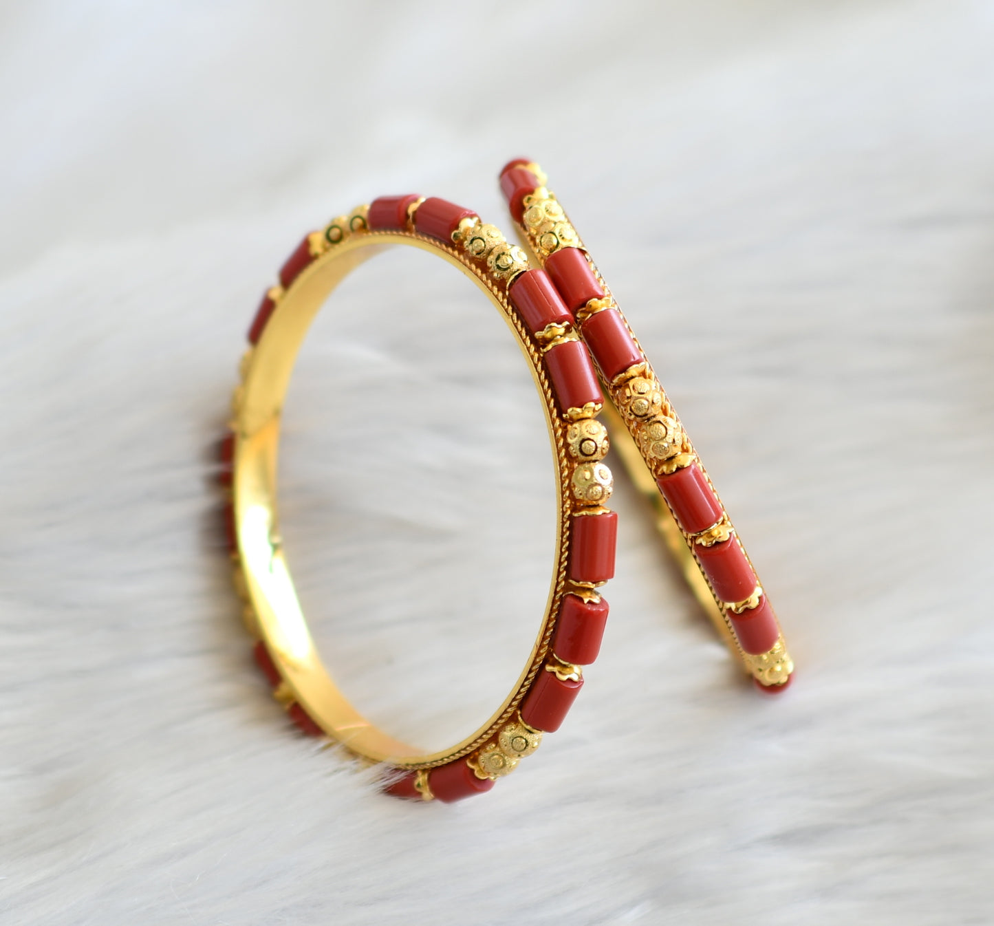 Gold tone coral beaded bangles(2.4) dj-23678