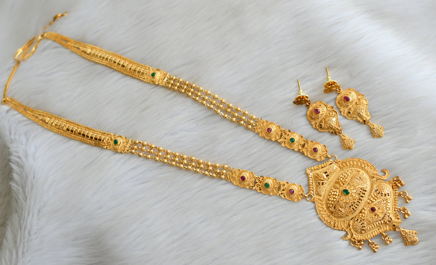 Gold forming ruby-green haar set dj-17825