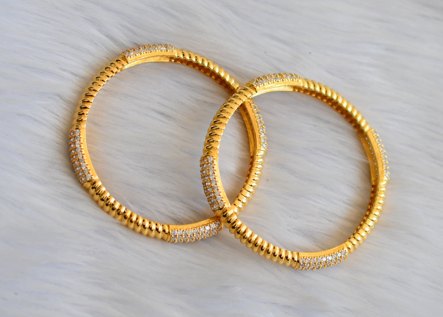 Gold tone cz bangles (2.8) dj-29416