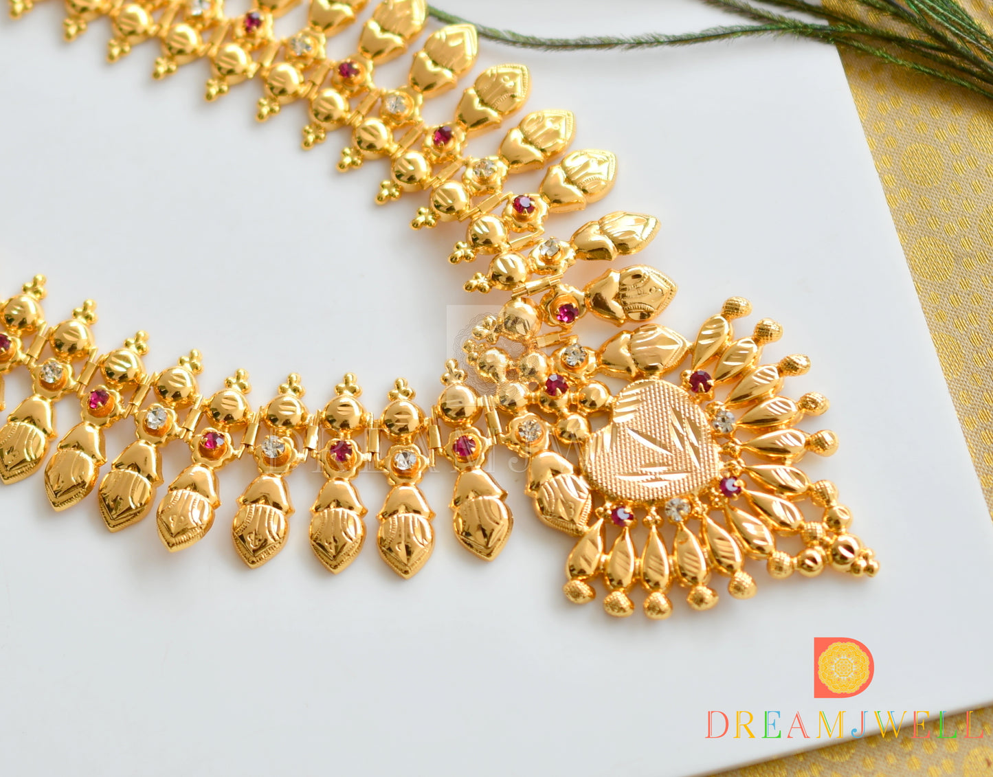 Gold tone pink-white stone Kerala style haar dj-36841