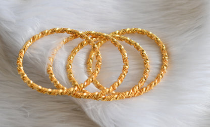Gold tone set of 4 bangles(2.4) dj-39286