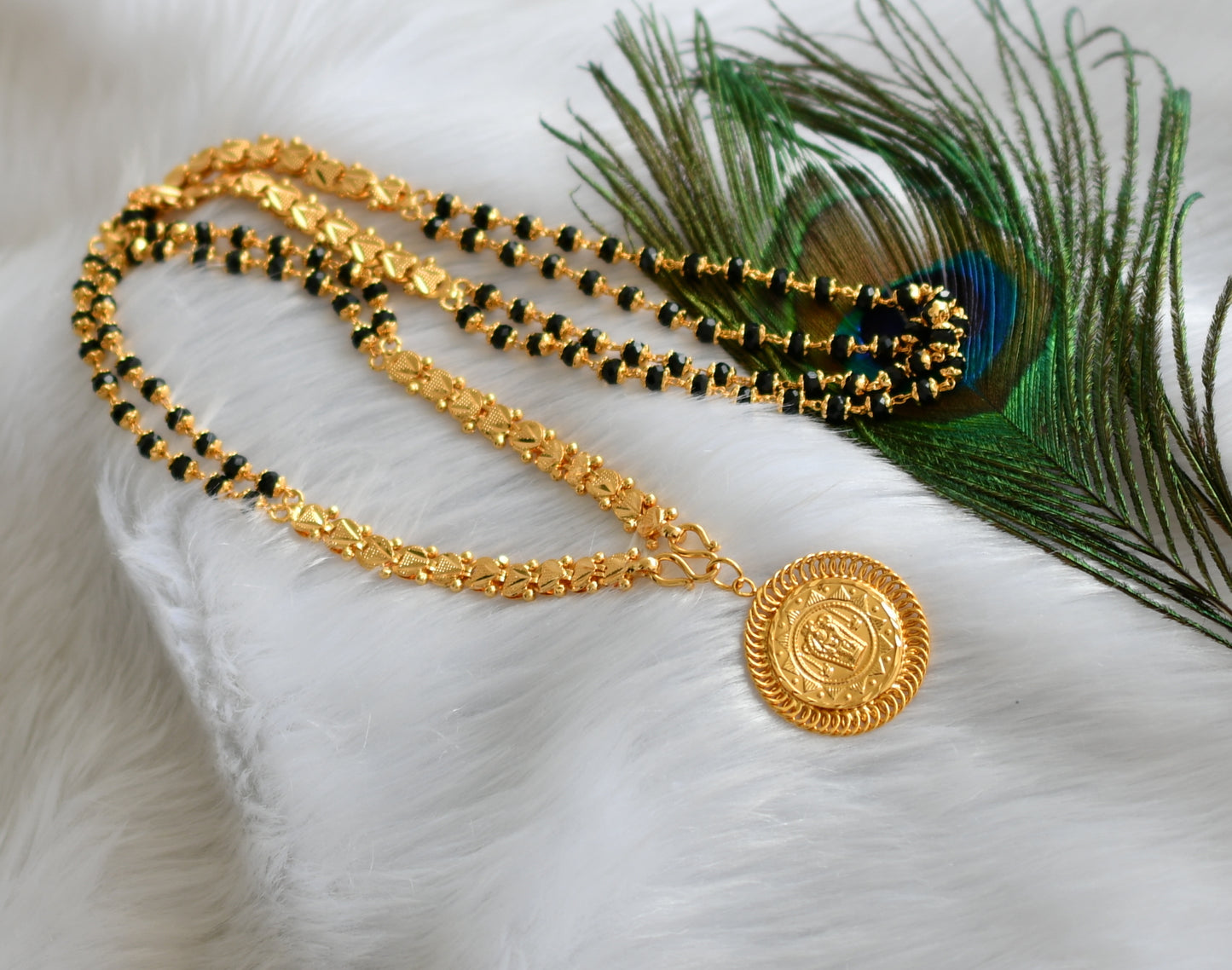 Gold tone karimani Guruvayurappa pendant with chain dj-38536