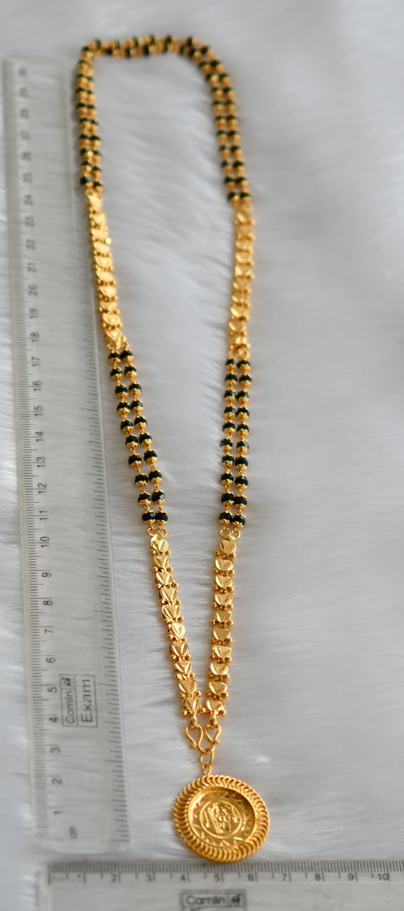 Gold tone karimani Guruvayurappa pendant with chain dj-38536