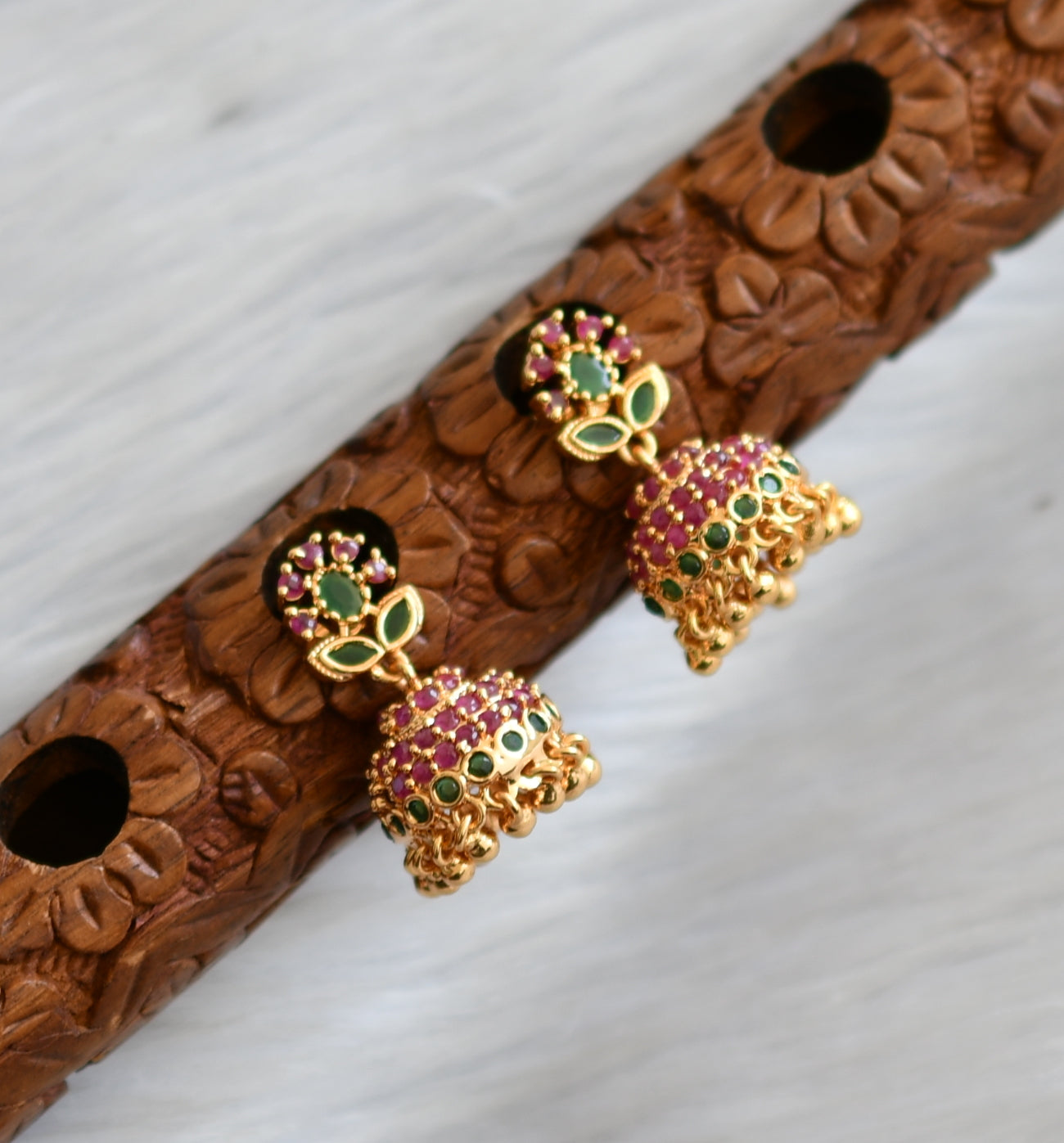 Gold tone ruby-green small jhumkka dj-40859