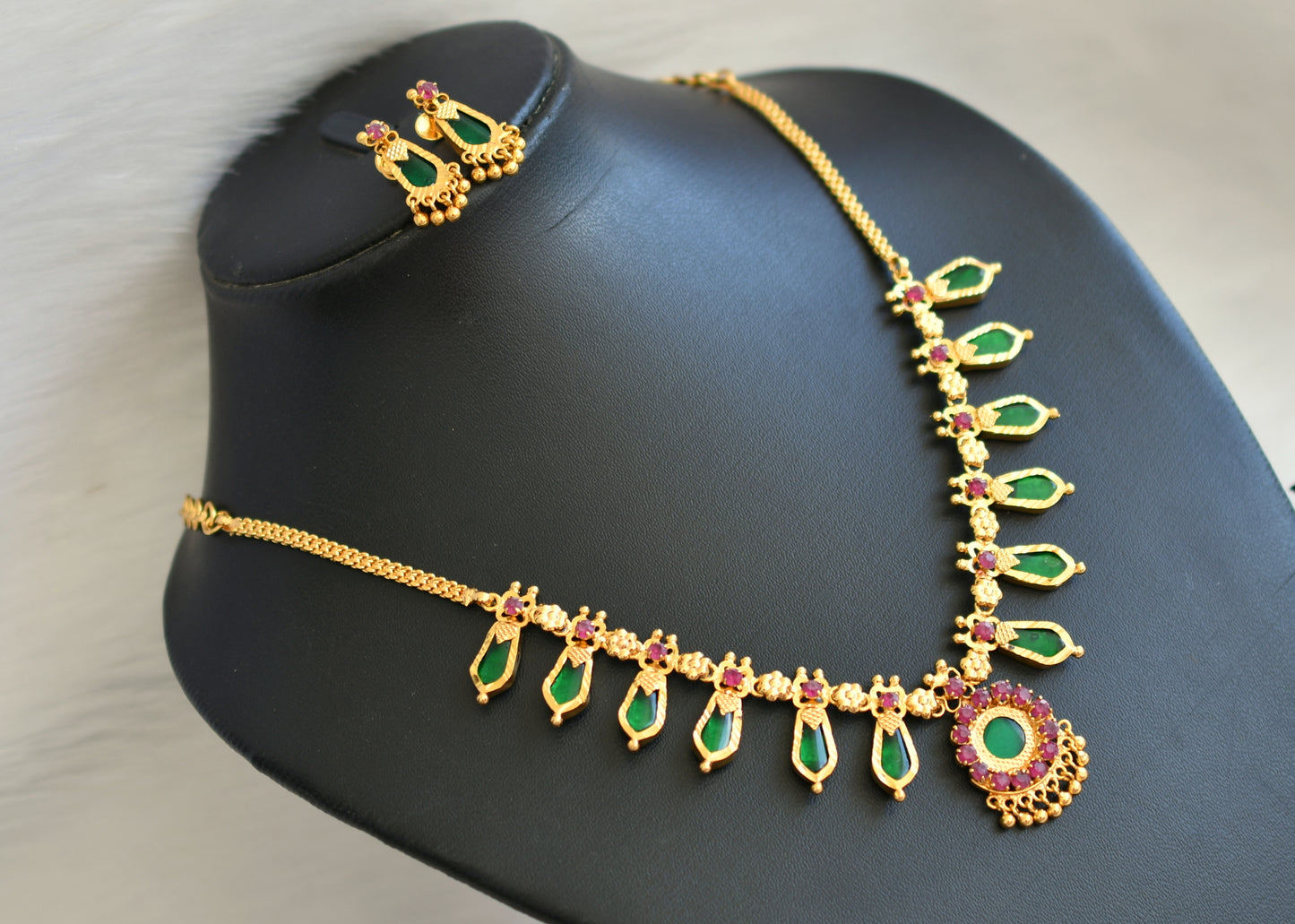 Gold tone pink-green nagapadam  necklace set dj-33656