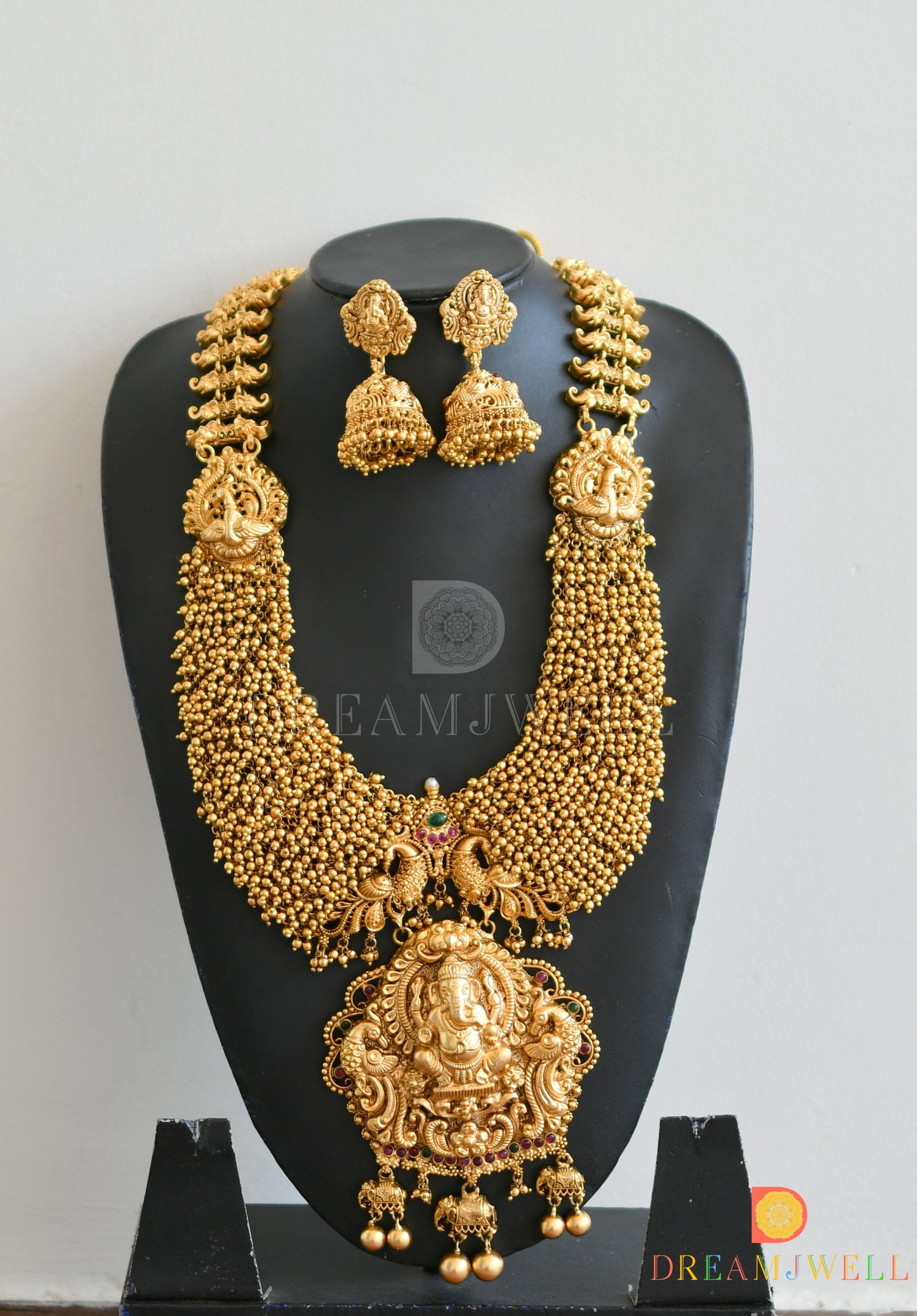 Matte finish Ganesha-peacock gold cluster haar set dj-36214