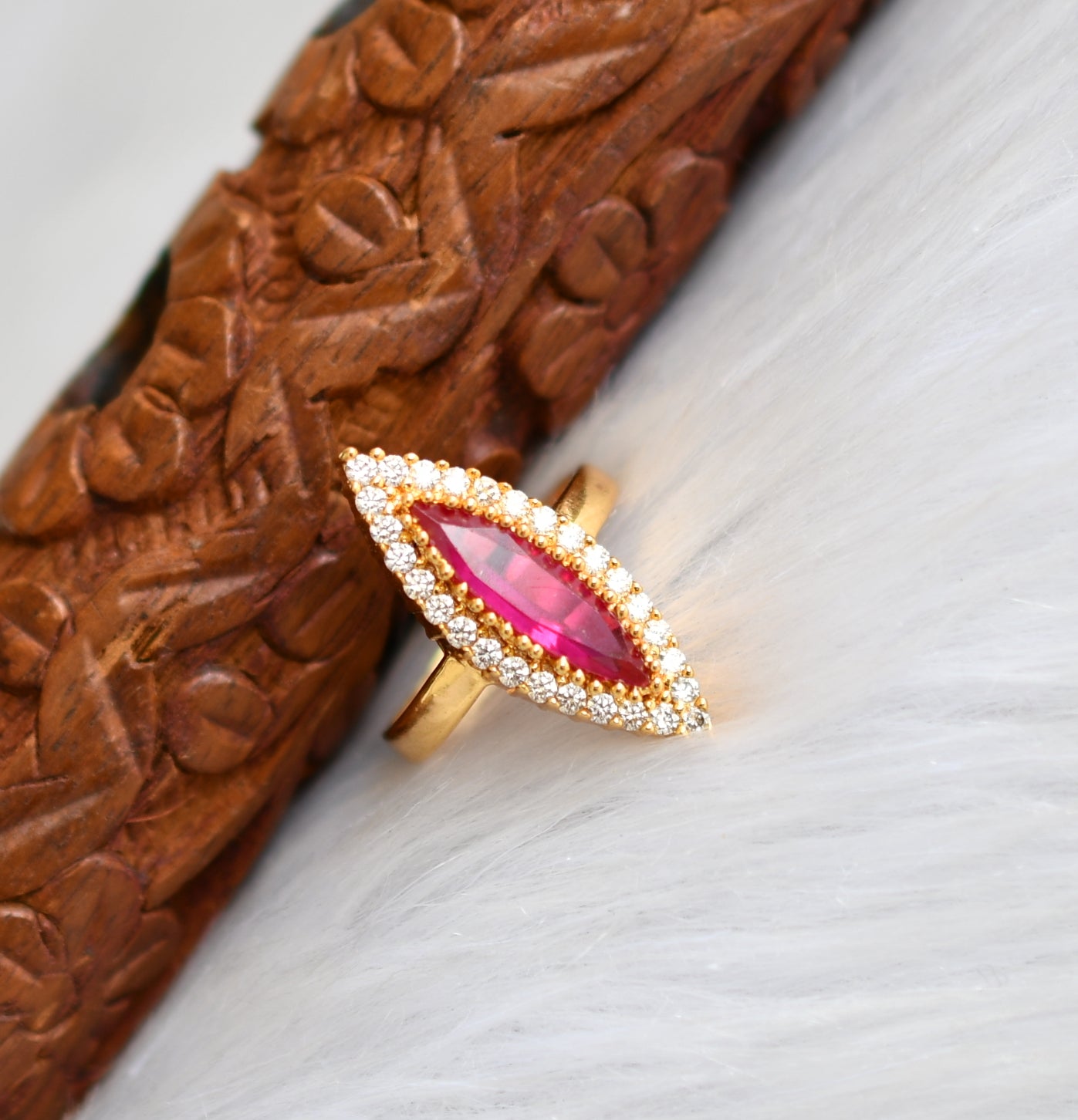 Abharan Jewellers - This broad tabled & thin band finger ring, centered  with ruby stone and surrounded by round cut diamonds, will the glow to your  bridal getup. #abharan #abharanjewellers #abharandiamonds  #diamondsareforever #