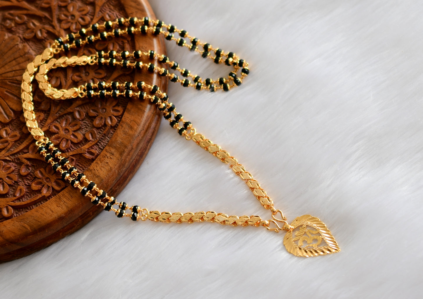 Gold tone 'om' pendant with double layer karimani mala dj-38585