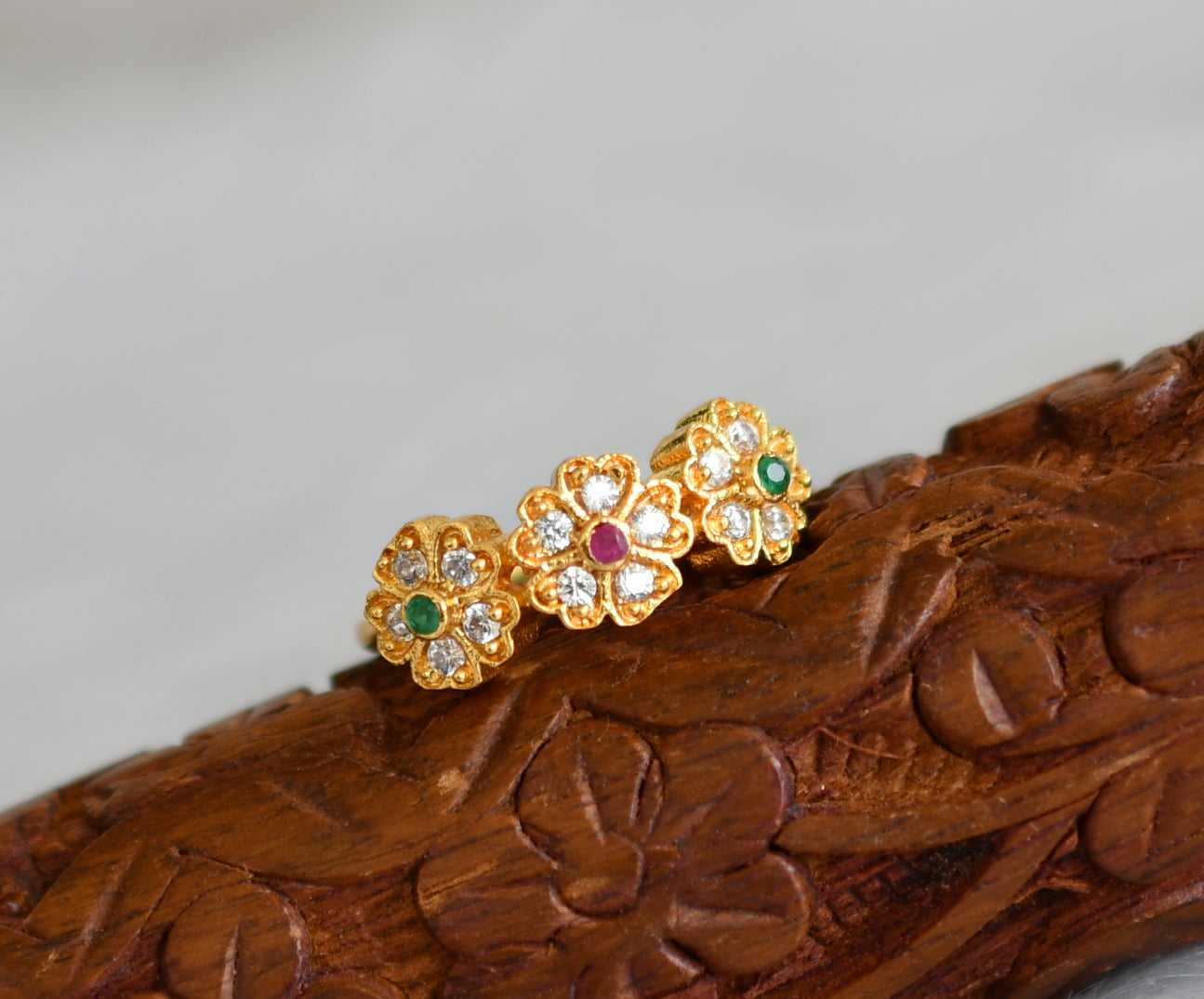 Gold tone white-ruby-green flower finger ring dj-40048