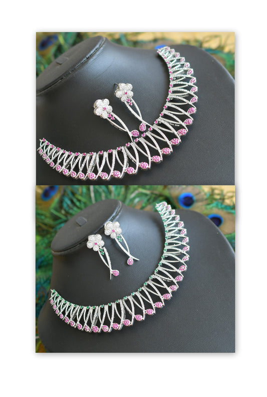 Silver tone ruby-emerald-white stone necklace