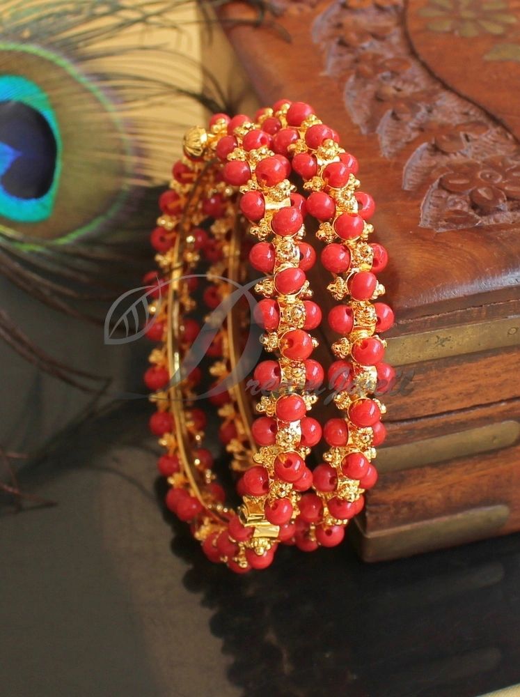 Coral bangle designs hot sale in gold